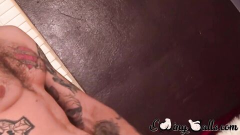 Tattooed Corey Gunz shows off his balls and dick and wanks it to the end