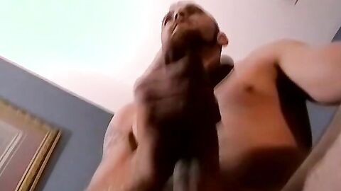 Tattooed amateur is jerking his big cock and prepares to cum