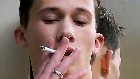 Hottie Braden Spence smokes reds while jerking and end it with a massive load of cum