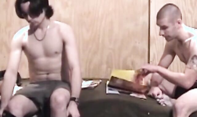 Tattooed jocks jerk off together before fucking a sex doll